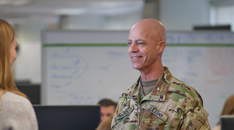 Col. Darby McNulty and the members of his IPPS-A development team work in an  open office to boost collaboration.