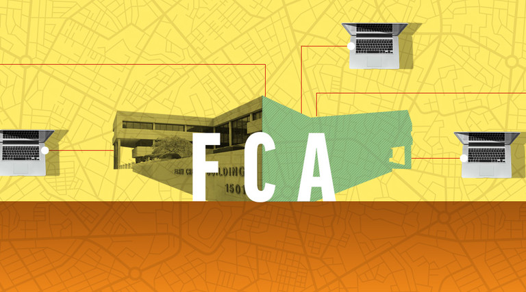 FCA building with computers surrounding it