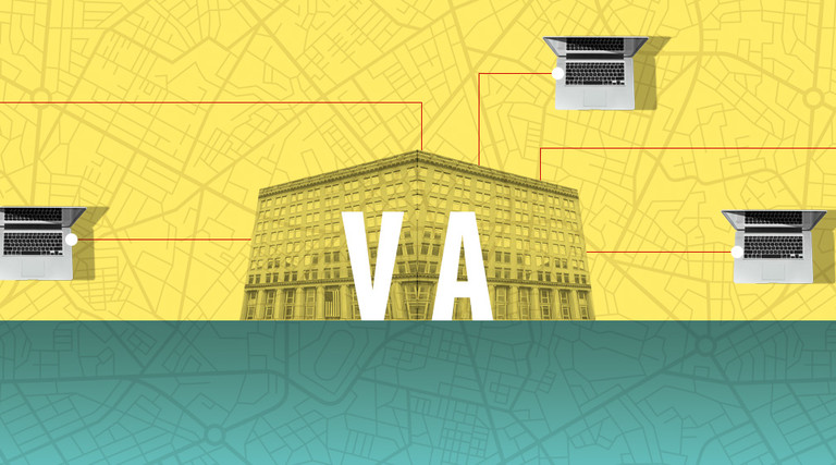 VA building with maps and computers