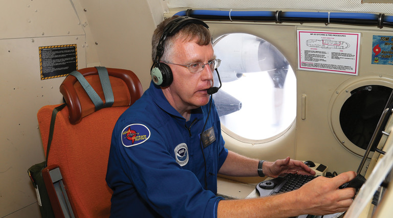 Flight director Rich Henning on N42RF speaking into headset