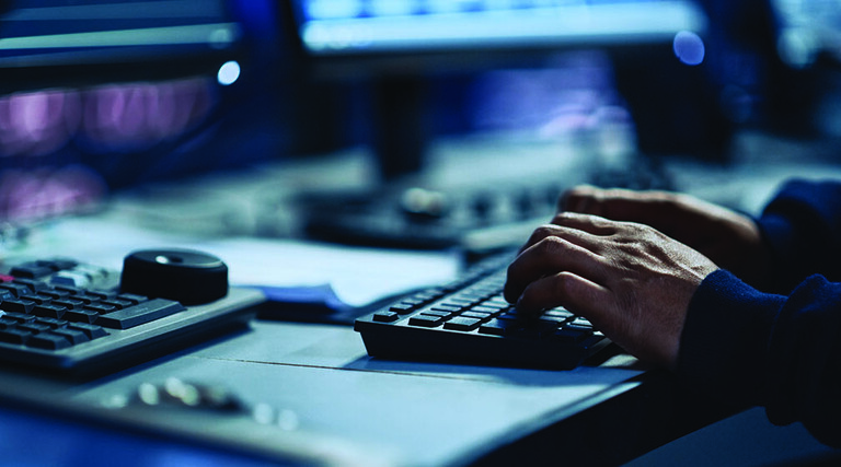 An analyst at a keyboard