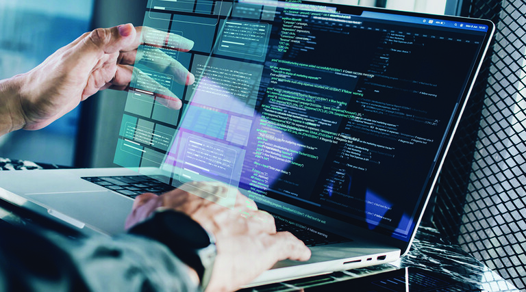 man working on a laptop