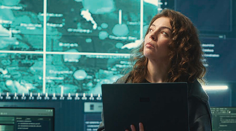 Person observing screens in SCIF