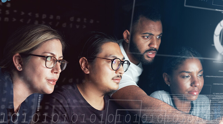 People looking at computer