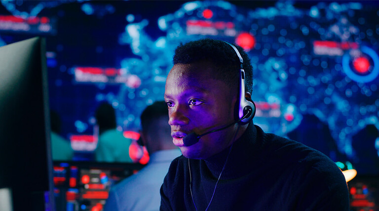 Person using headset at computer