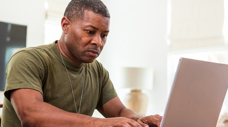 Person using computer at home