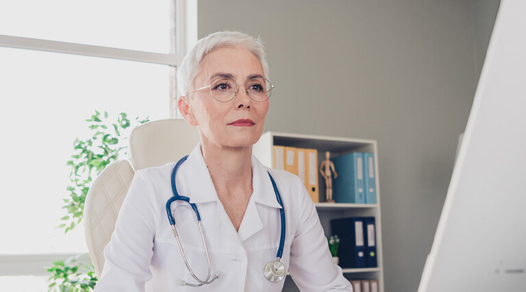 Doctor using computer