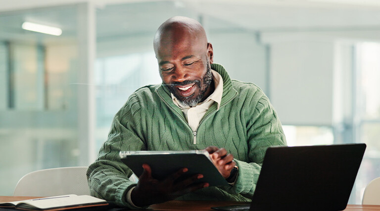 Person using tablet in the office
