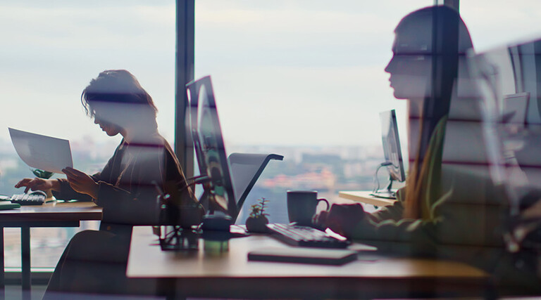 Busy corporate office silhouettes
