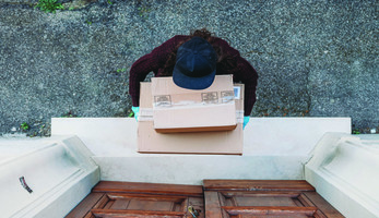 Person delivering packages, seen from overhead