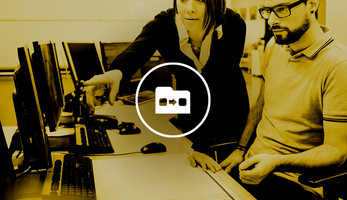 IT professionals in control room