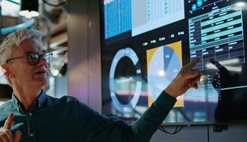 Person giving presentation in the office