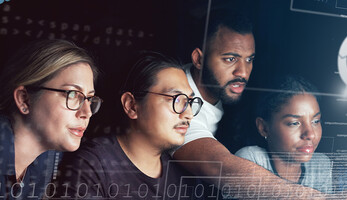 People looking at computer