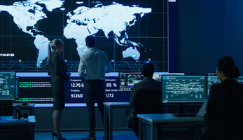 People looking at digital map