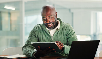 Person using tablet in the office