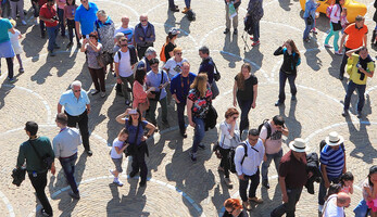 People walking through city