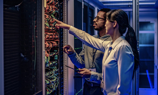 People assessing a data center