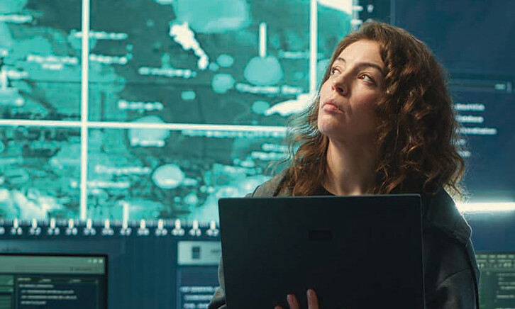 Person observing screens in SCIF