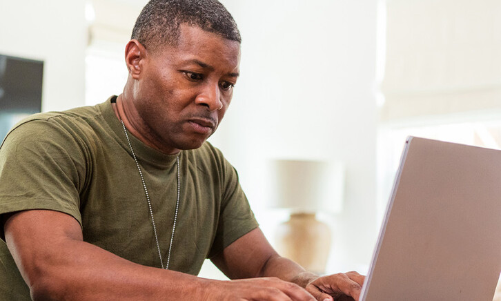 Person using computer at home