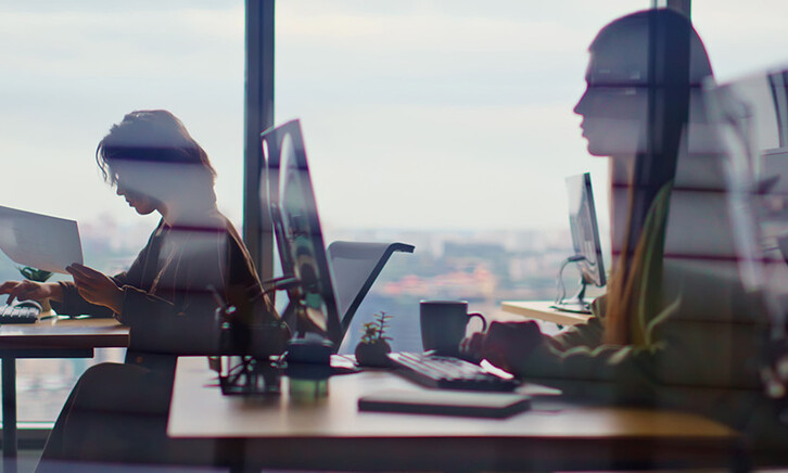 Busy corporate office silhouettes