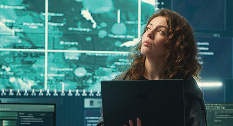 Person observing screens in SCIF