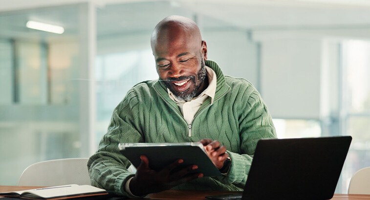 Person using tablet in the office