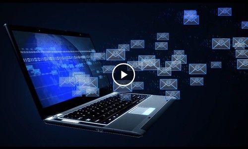 Laptop with images of emails flying out of the screen