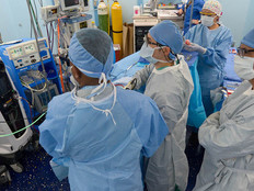 Federal doctors in surgery