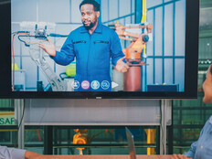employees in conference room watching a virtual training