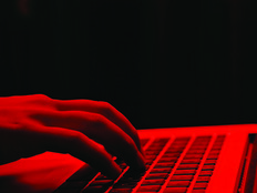 Red keyboard with hand