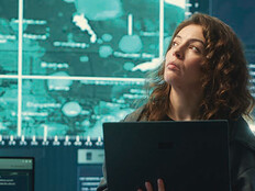 Person observing screens in SCIF