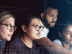 People looking at computer