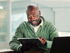 Person using tablet in the office