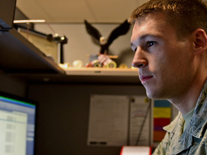 Staff Sgt. Chris Meyer, a 28th Contracting Squadron contract administrator, reviews paperwork at Ellsworth Air Force Base, S.D., Nov. 4, 2015.