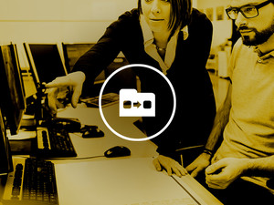 IT professionals in control room