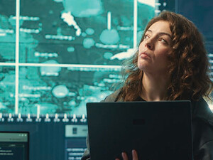 Person observing screens in SCIF