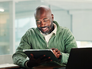 Person using tablet in the office
