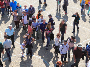 People walking through city
