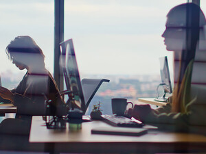 Busy corporate office silhouettes