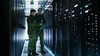 Army officers in a data center 
