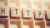 HTTPS spelled out in blocks on a shelf 