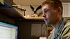 Staff Sgt. Chris Meyer, a 28th Contracting Squadron contract administrator, reviews paperwork at Ellsworth Air Force Base, S.D., Nov. 4, 2015.
