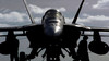 An F/A-18E Super Hornet assigned to the Eagles of Strike Fighter Squadron One Five (VFA-115) on the flight deck aboard USS Ronald Reagan (CVN 76), awaiting the next launch cycle.