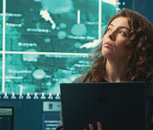 Person observing screens in SCIF