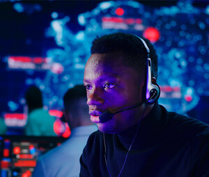 Person using headset at computer