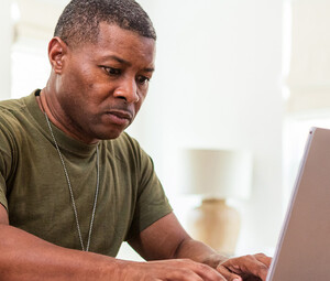 Person using computer at home