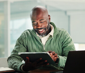 Person using tablet in the office